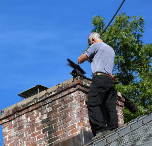 Firebox cleaning with protective equipment in place